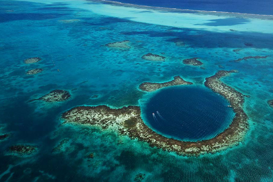 Scenari naturali del Belize e della sua barriera corallina, mete delle escursioni che partiranno dal resort Caye Chapel